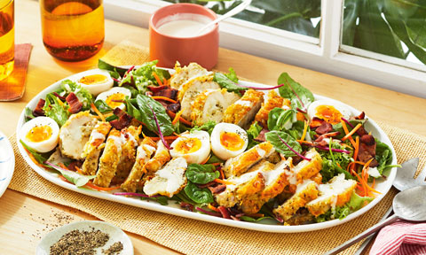 Crumbed chicken with caesar salad
