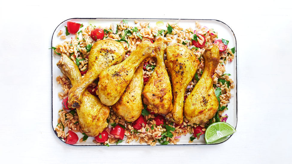 Seven curried chicken drumsticks with lentil and rice salad