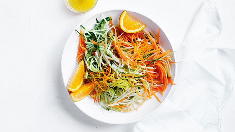 Jessica’s carrot salad with cucumber and orange wedges