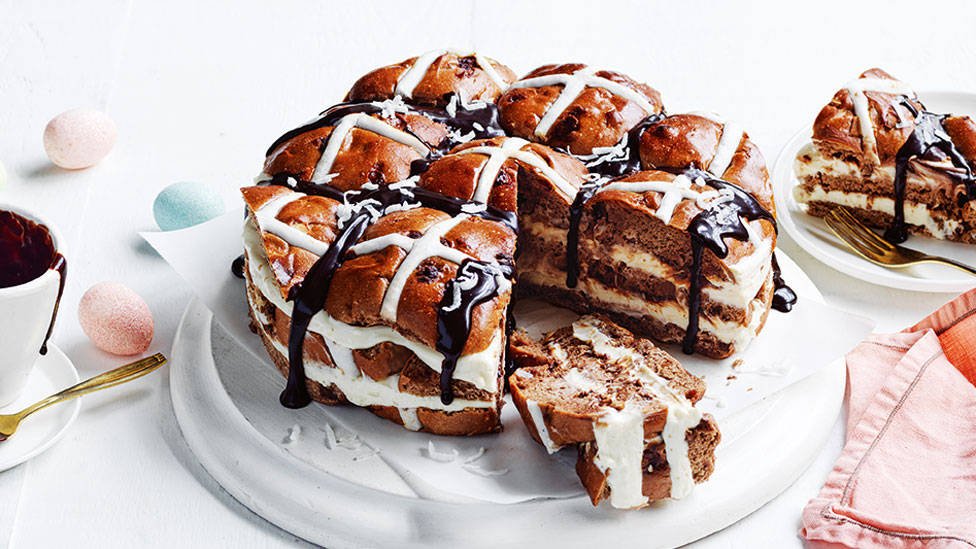 Chocolate and coconut hot cross bun fridge cake drizzled with chocolate sauce