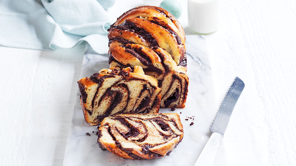 Thickly sliced chocolate babka with choc filling and sugar syrup
