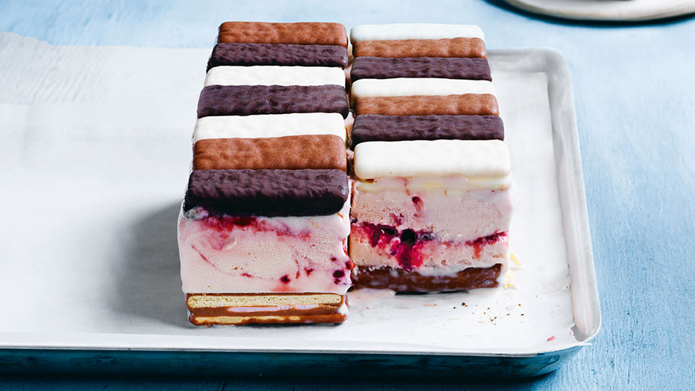 Frozen ripple slices topped with original, white and dark Tim Tam biscuits