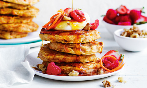 Stacks of carrot cake pancakes with berries