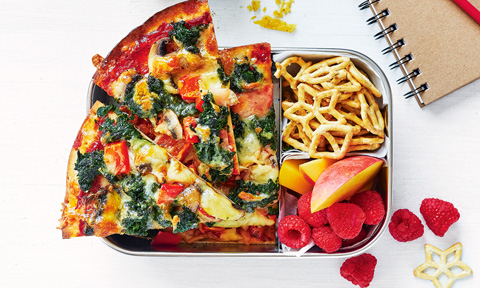 3 slices of spinach and mushroom pizza in a lunch box with some fruit