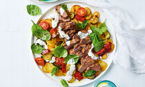 Thickly cut lamb with warm Mediterranean vegetable salad