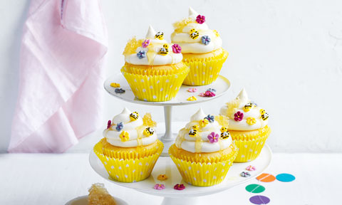 5 beehive cupcakes on a high tea stand