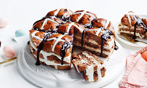 Chocolate and coconut hot cross bun fridge cake drizzled with chocolate sauce