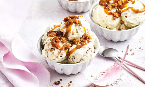 Easy hot cross bun ice-cream balls drizzled with salted caramel
