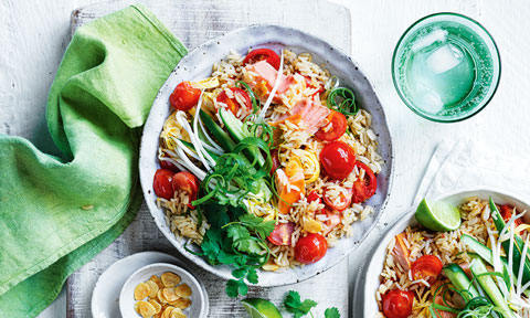Fried rice with hot-smoked salmon and tomatoes