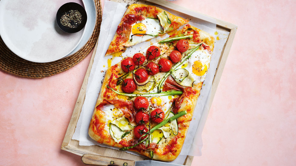 Breakfast focaccia with tomatoes and prosciutto