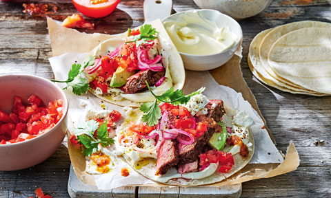 Steak tacos with fetta and salsa roja