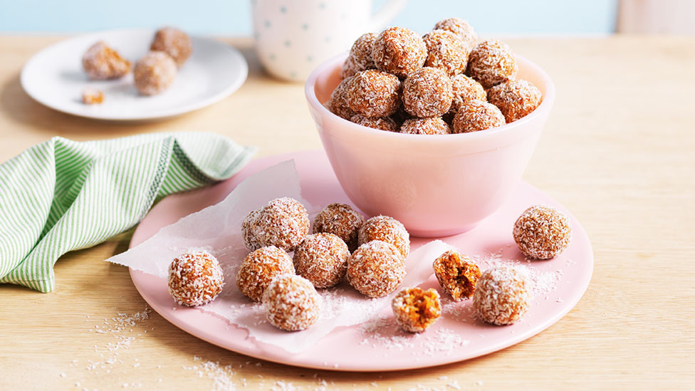 Bliss balls served in a pink bowl