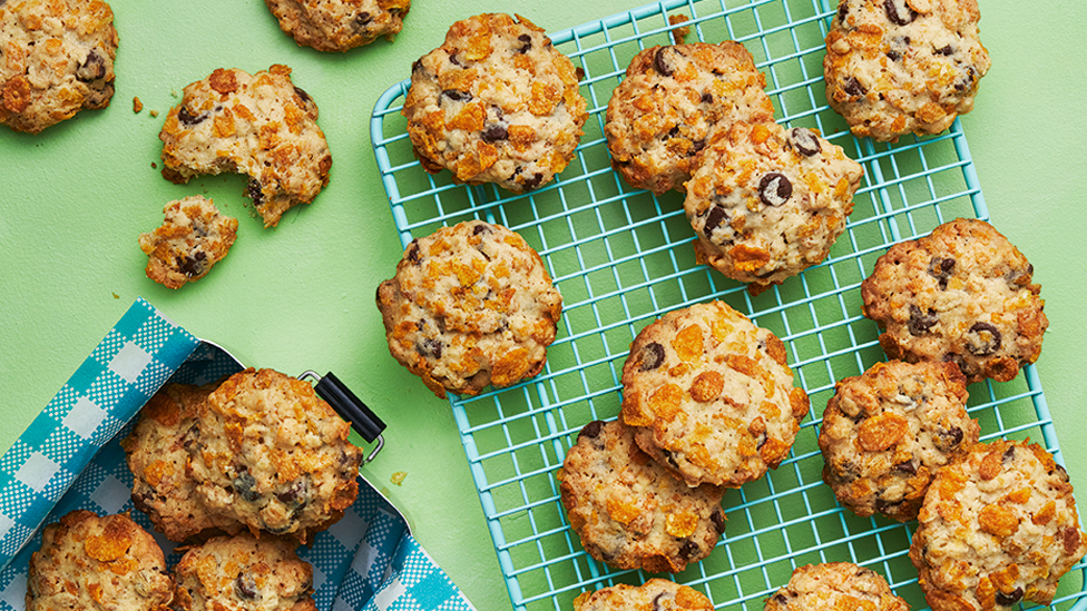 Chocky rock cookies served on a cooling rack and in a tin lunch box