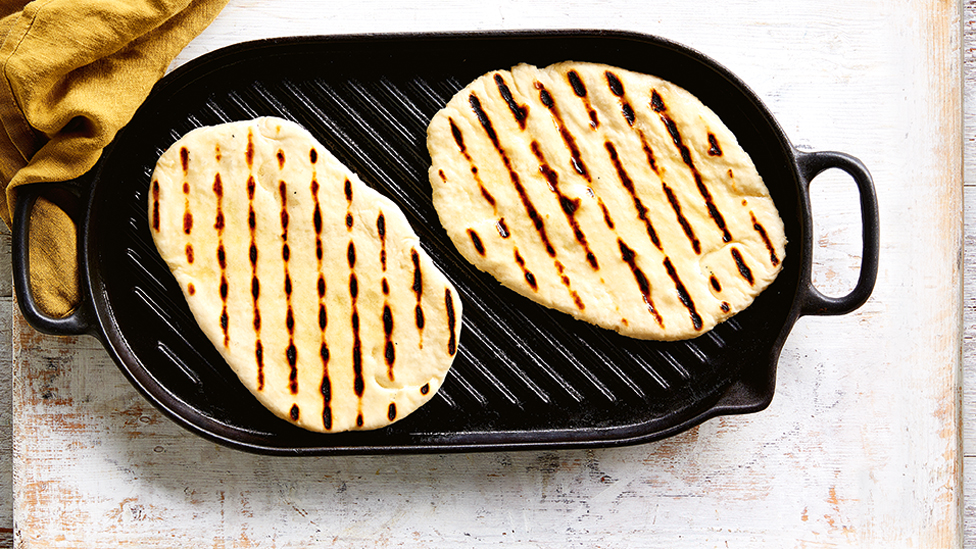 Two pieces of naan