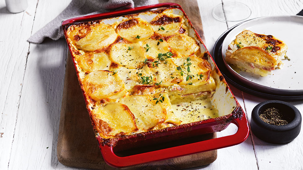 Potato and leek gratin served in a baking dish