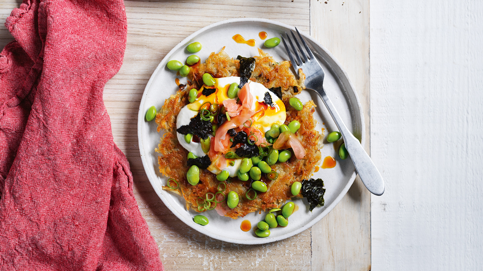 Potato pancake with teriyaki, spring onion, edamame and ginger on top