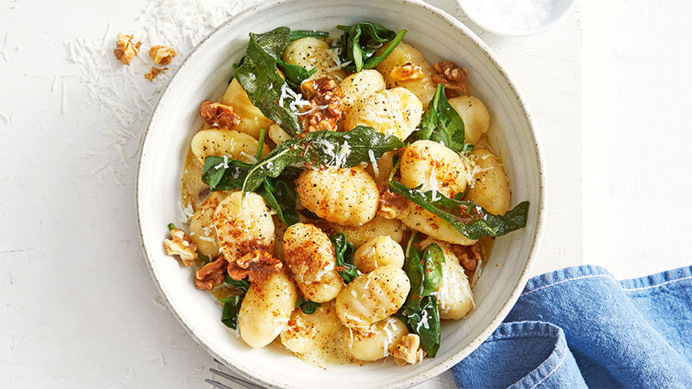 Gnocchi with burnt butter, walnuts and crispy sage served in a bowl