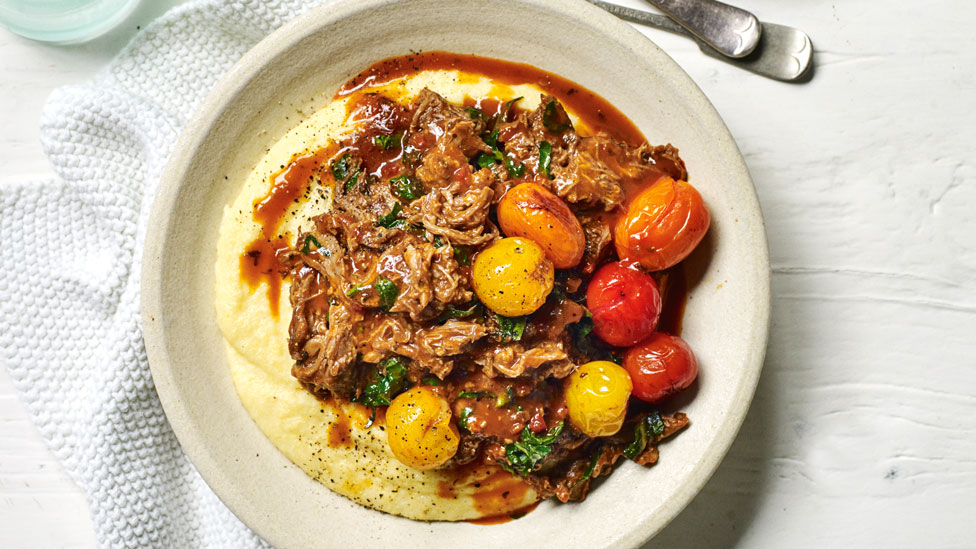 Beef and Tomato Ragu with Polenta in a serving bowl