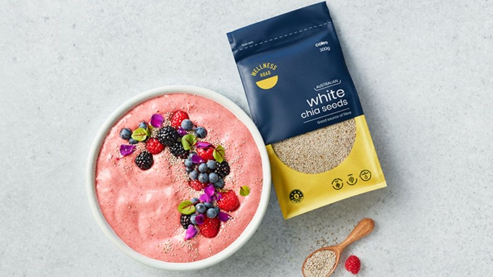 Chia, Beet & Banana Smoothie Bowls in white bowl next to package