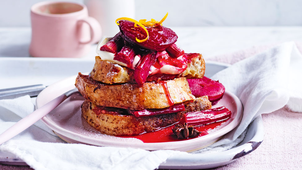 French Toast with Plum and Rhubarb on plate and tea towel