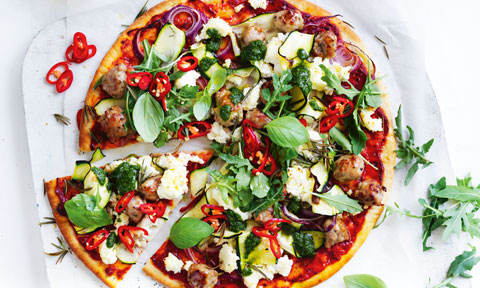 Pork Sausage and Ricotta Pizza garnished with rocket and chilli