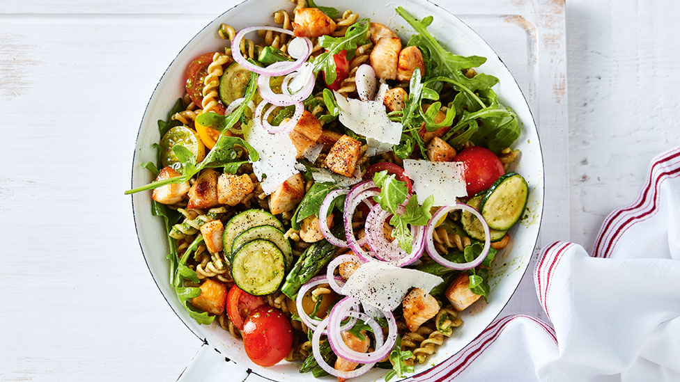 Chicken pesto pasta with tomatoes and zucchini