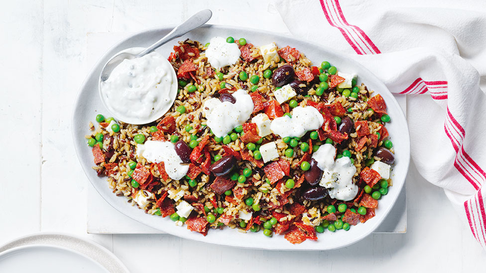 Mediterranean-style fried rice with salami and tzatziki dip