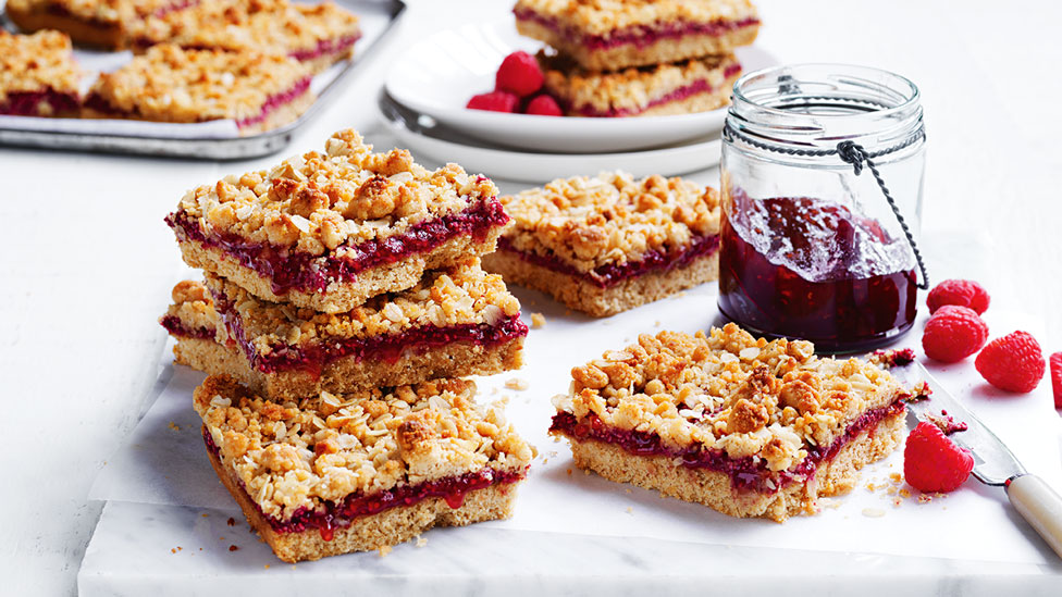 Vegan nutty berry and oat slices with raspberry jam