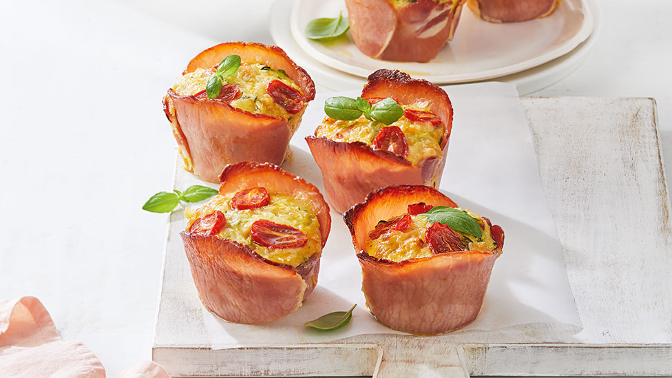 Four bacon wrapped egg muffins