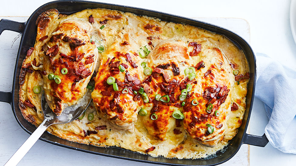 Cheesy chicken tray bake with leek, bacon and leaf salad