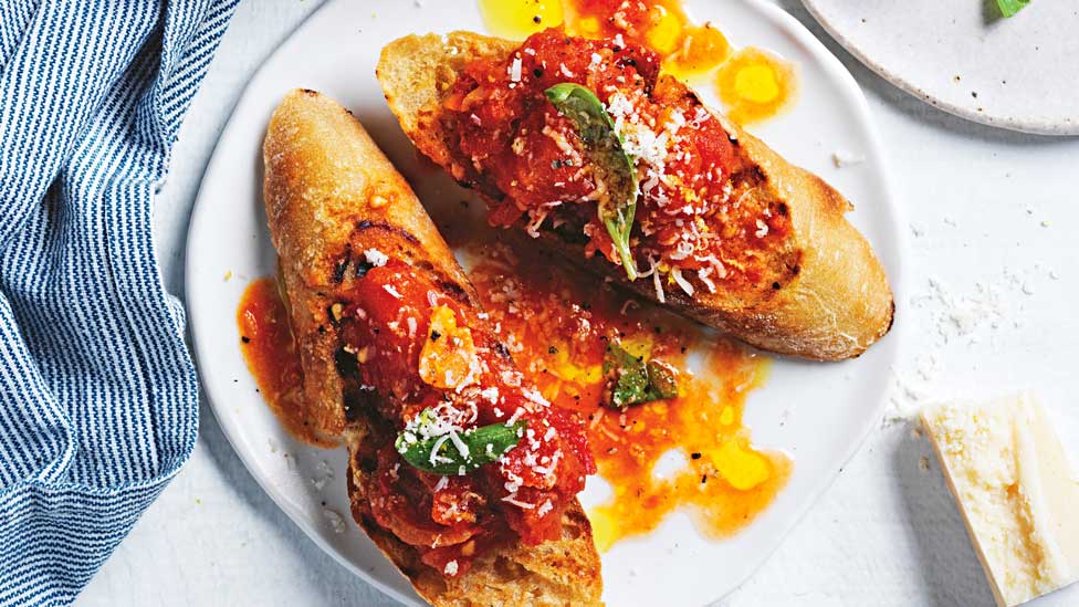 Two of Curtis’ bruschetta with tomato, parmesan and basil broth