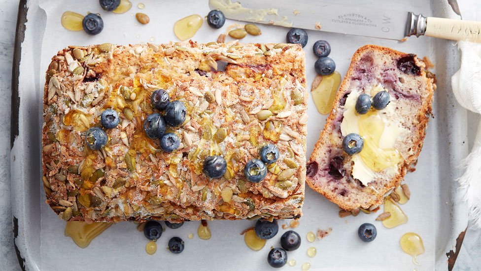 Gluten-free blueberry, coconut and seed loaf thickly sliced