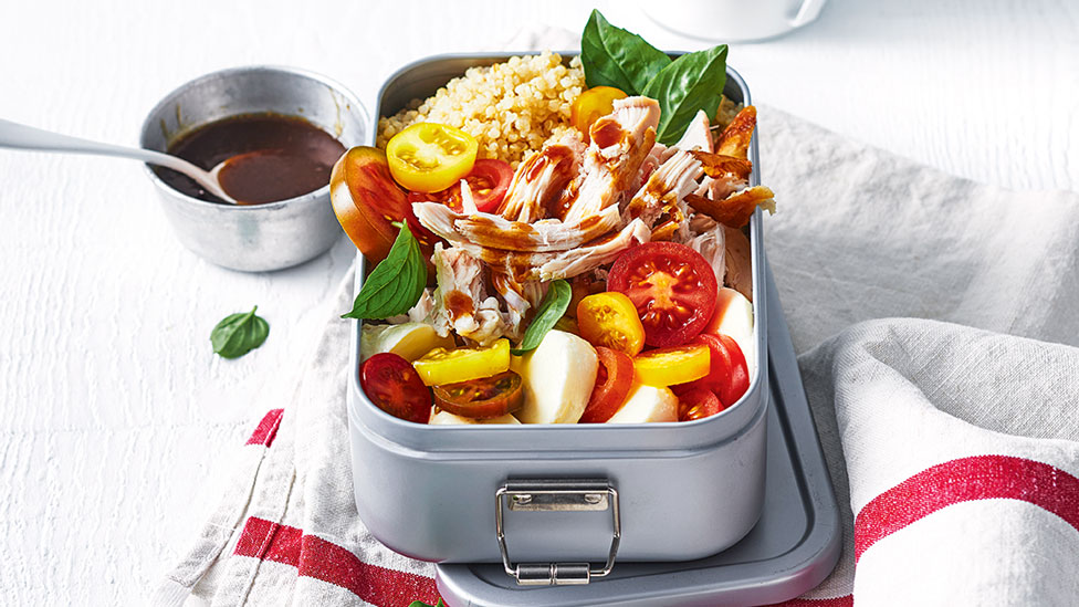 Chicken and bocconcini quinoa salad in a metal lunch box