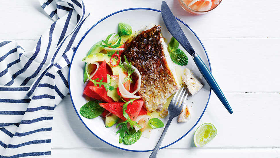 Crispy-skin barramundi portions with watermelon salad 