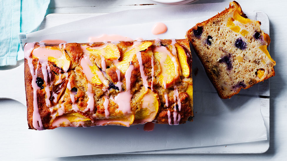 Thickly sliced peach, blueberry and walnut banana bread