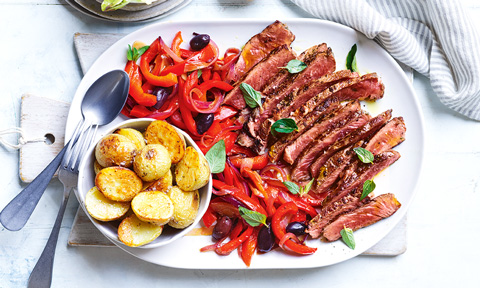 Garlic and oregano steak with olive peperonata and baby potatoes