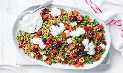 Mediterranean-style fried rice with salami and tzatziki dip