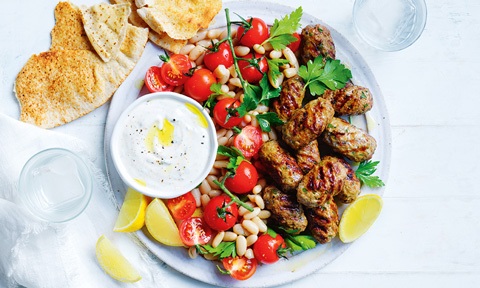 Mint and parsley kofta with tomato, white bean salad and pita bread