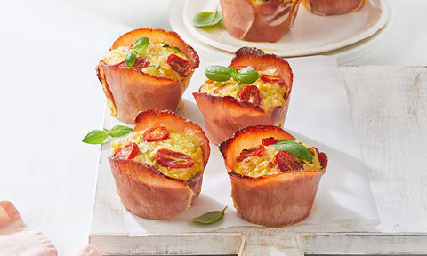 Four bacon wrapped egg muffins
