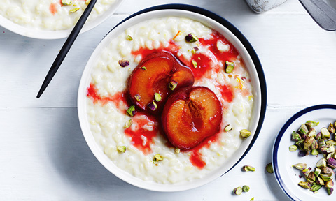 Rice pudding bowl with spiced plums