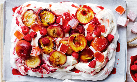 Slab pavlova with peaches and raspberries
