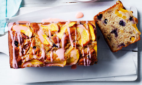 Thickly sliced peach, blueberry and walnut banana bread
