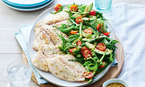 Pan-fried fish with avocado and asparagus salad