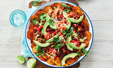 Vegan sweet potato nachos with beans and avocado
