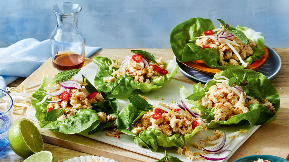 5 lettuce cups filled with marinated chicken mince, bean sprouts, rice and chilli.