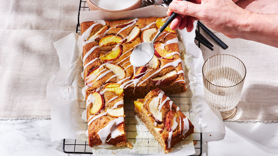 Banana cake with peach and coconut