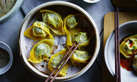 Pork mince dumplings with chopsticks