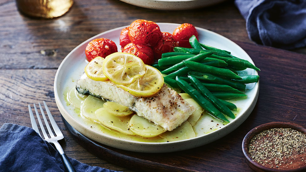 Easy barramundi parcels with roast tomatoes