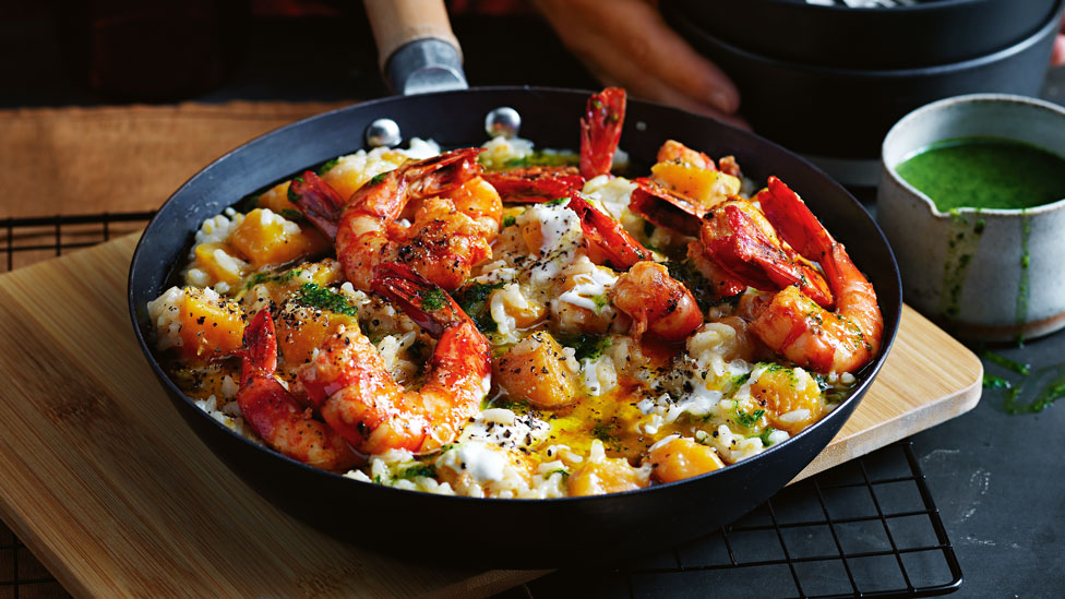 Pumpkin risotto with harissa prawns