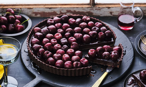 Luke Mangan’s dark chocolate tart with poached cherries